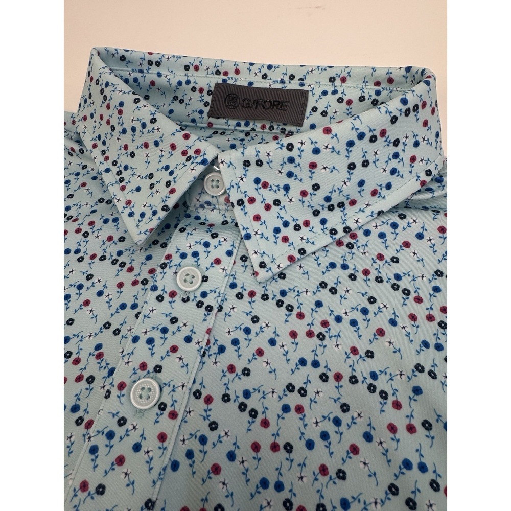 NWT G/Fore Aye Poppy Floral Golf Polo Shirt Size MEDIUM DBRK Blue  $110